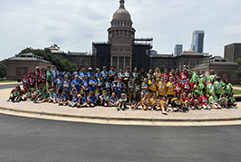  Students stand in front of the Texas Capit0l Building